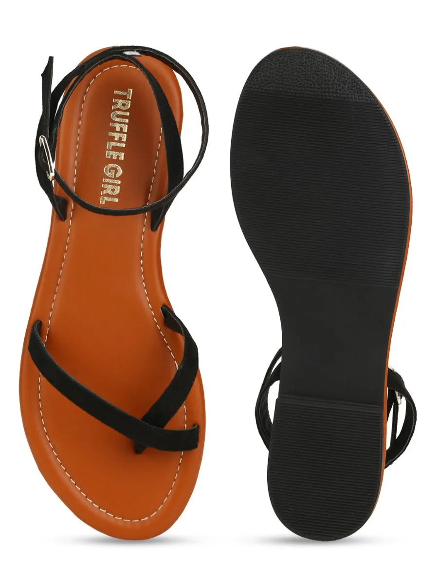 Sandales à bride bouclée en daim noir