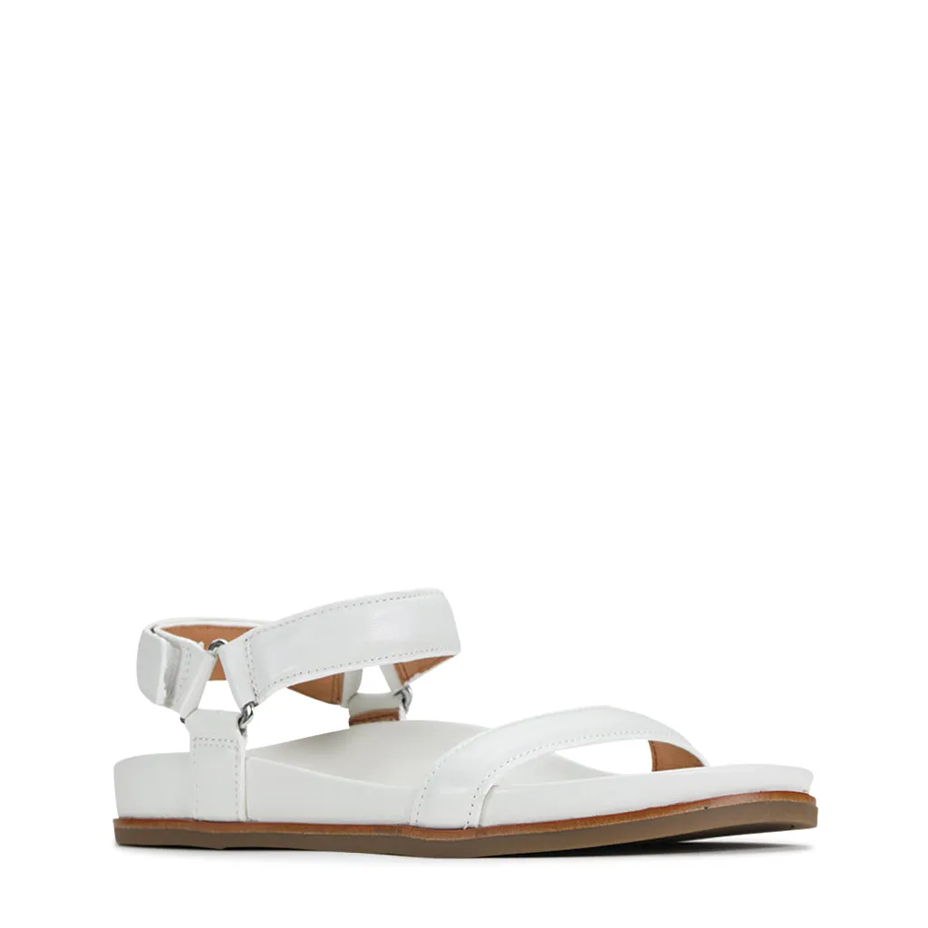 Lit moelleux en cuir caramel