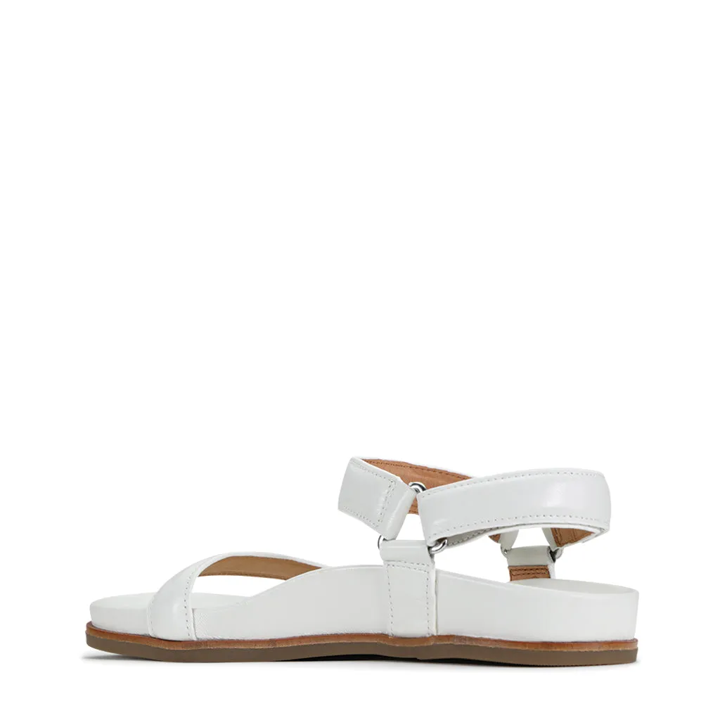 Lit moelleux en cuir caramel