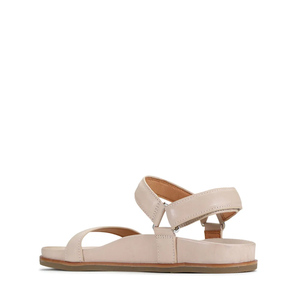Lit moelleux en cuir caramel