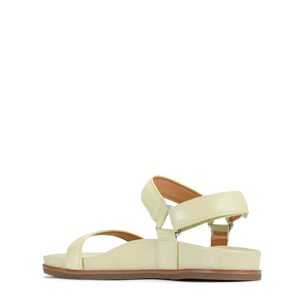 Lit moelleux en cuir caramel