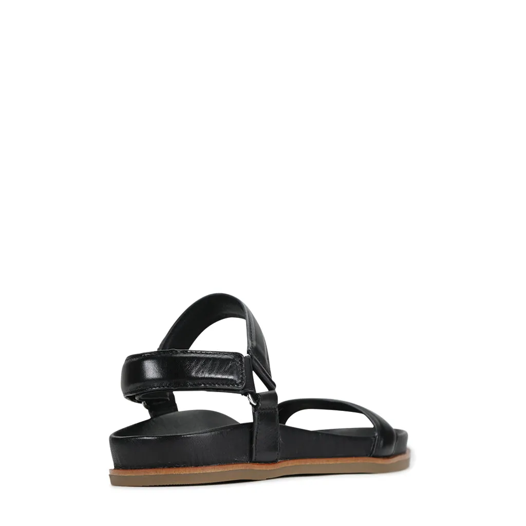 Lit moelleux en cuir caramel