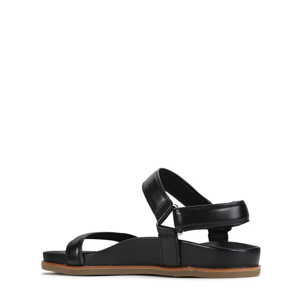 Lit moelleux en cuir caramel